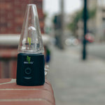 Black Sicko Atom 2 in 1 Dry Herb Atomizer On A Ledge