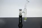 Mini Henail Concentrate Vaporizer Kit with cap on a black table